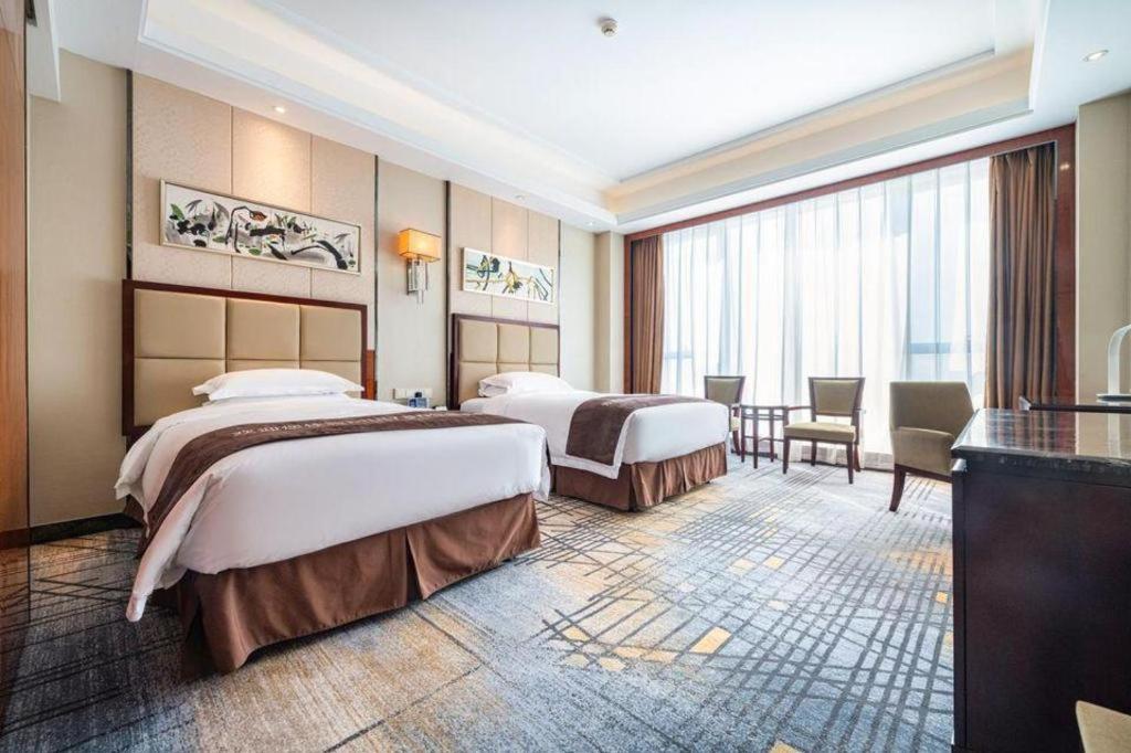 Eurasia Convention International Hotel Ухань Экстерьер фото