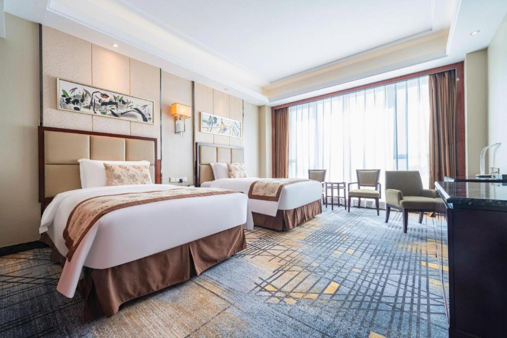 Eurasia Convention International Hotel Ухань Экстерьер фото